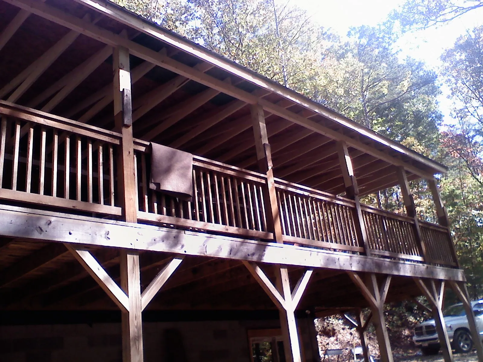 Timber framing under a new elevated porch and deck — Roof Leak Repair in Jensen Beach by Roofing Brothers